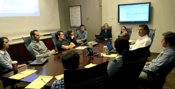 A Brafton content marketing team meets in a conference room