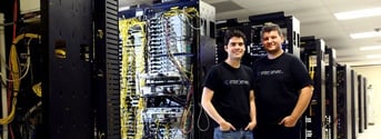 InterServer Co-Founders John Quaglieri and Mike Lavrik pose in their datacenter