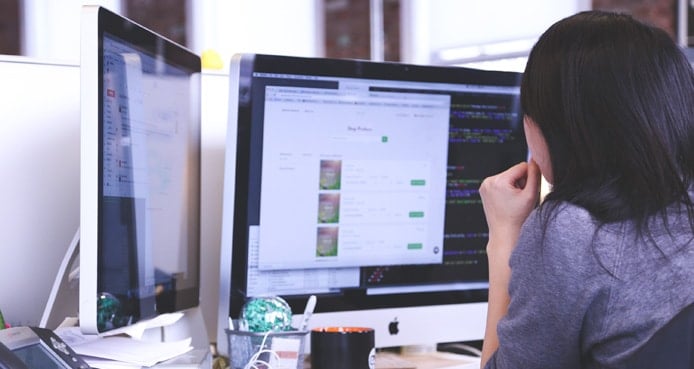 Photo of business person computing Photo of business person computing