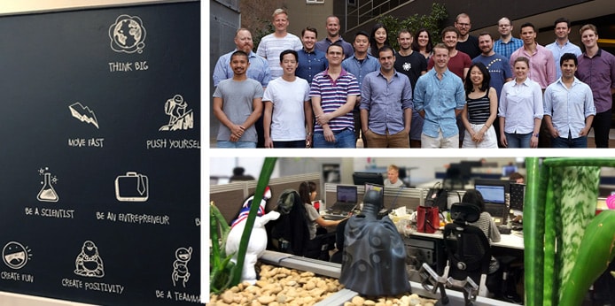 Wall of company values with photos of the DesignCrowd team and office