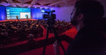 Photo of Sonic Foundry videographer recording conference proceedings 