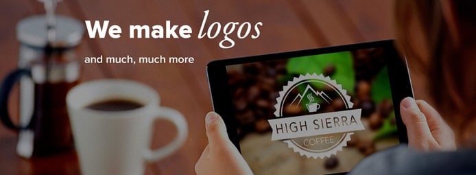 Photo of person holding a tablet with a Logoworks-created logo on it Photo of person holding a tablet with a Logoworks-created logo on it