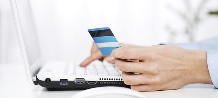 Image of someone making an online payment Image of someone making an online payment