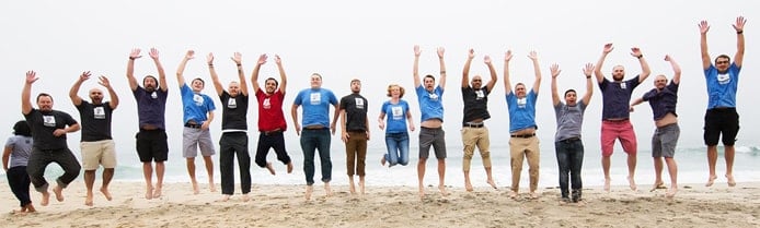 Image of Pagely team jumping on the beach Image of Pagely team jumping on the beach