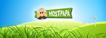 HostPapa logo above green hills with wind energy turbines