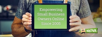 Photo of a man holding a tablet with "Empowering Small Business Owners Online Since 2005" on the screen and the HostPapa logo