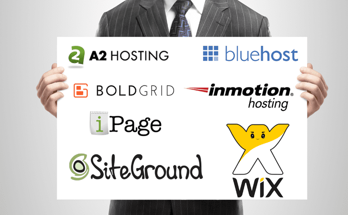 Photo of a man holding up a whiteboard with host logos Photo of a man holding up a whiteboard with host logos