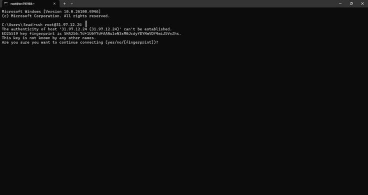 Command prompt showing SSH connection attempt with host authenticity warning and fingerprint confirmation.
