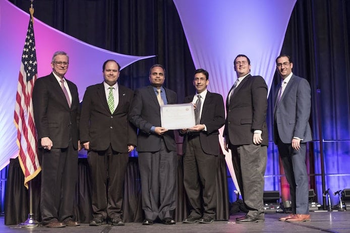 Photo of CSE department heads accepting the NCAE designation Photo of CSE department heads accepting the NCAE designation