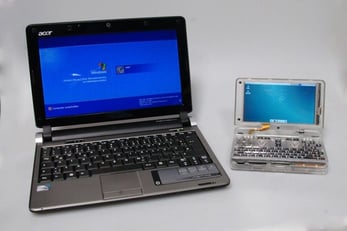 Photo of Pyra next to a laptop