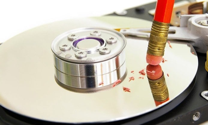 Image of HDD being 'erased' with pencil eraser Image of HDD being 'erased' with pencil eraser
