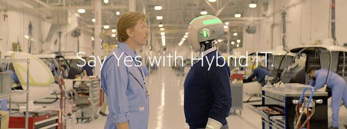 A worker meeting with a robot