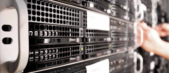 Image of hands working on a server