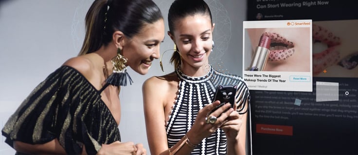 Two women internet users using Outbrain