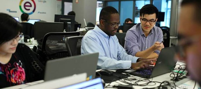 Workers in an office setting Workers in an office setting
