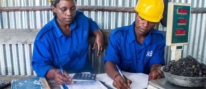 Workers in a sustainable/ethical tech mining environment
