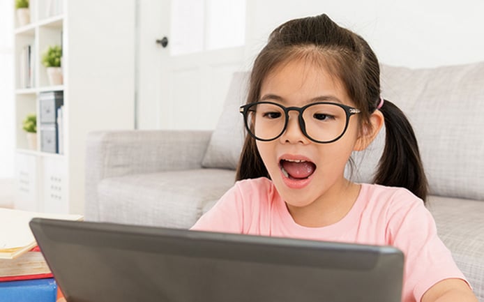 Child Using SoapBox Labs Voice Interface Technology