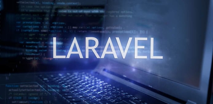 Laravel text with computer background Laravel text with computer background