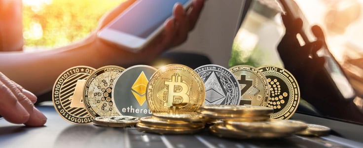 cryptocurrency coins on a laptop cryptocurrency coins on a laptop
