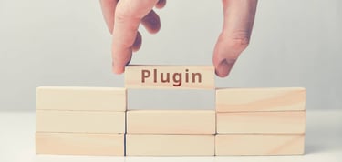 Dropping a wood block into place with the word "plugin"