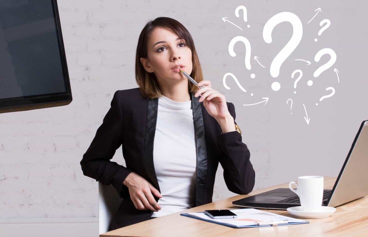 Woman questioning at a computer