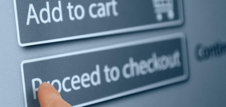 Person pointing to checkout button Person pointing to checkout button