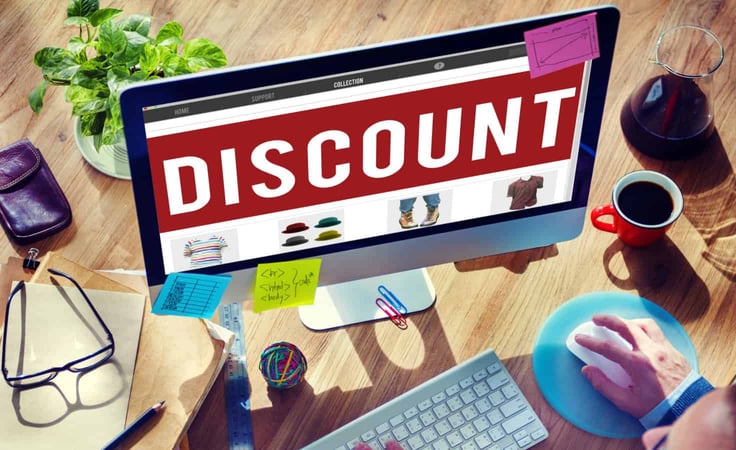 Computer screen with the word "discount" Computer screen with the word "discount"