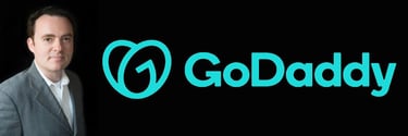 GoDaddy logo and headshot of Joe Styler