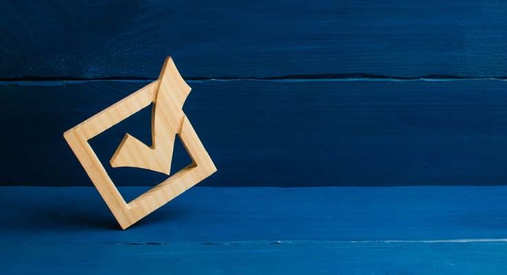 A Check Mark on a Blue Backdrop A Check Mark on a Blue Backdrop