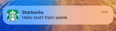 A screenshot of the Starbucks notification: "Hello test1 from seank."