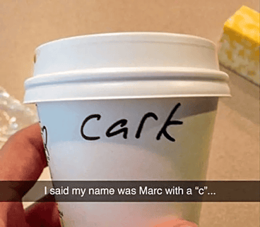 Photo of Starbucks cup with misspelled name