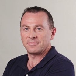 a headshot of Eli Brosh, Wix's Head of AI Research
