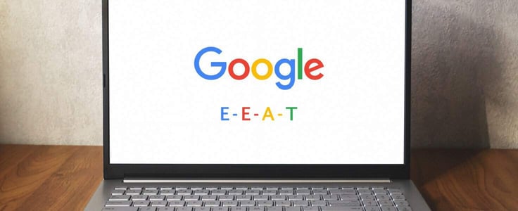 Google E-E-A-T on laptop screen on desk. Quality Rater Guidelines update. Experience added. 