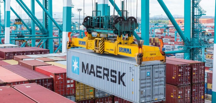 Container loaded by gantry crane on the container ship in Malaysia Container loaded by gantry crane on the container ship in Malaysia