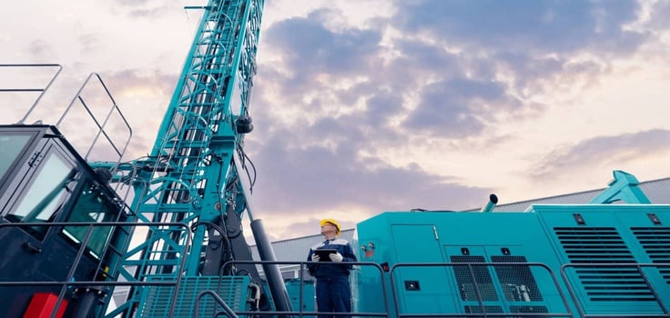 Industry operator use computer tablet for control drilling rig for exploration of minerals for oil, gas and artisan water. Industry operator use computer tablet for control drilling rig for exploration of minerals for oil, gas and artisan water.