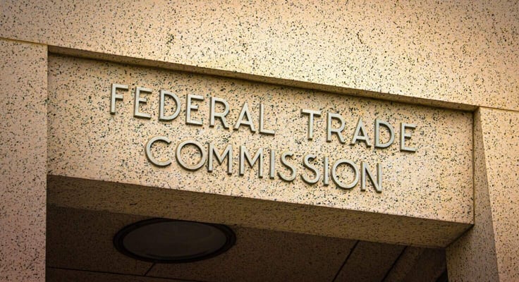 Sign on Doorway for the Federal Trade Commission in Washington D.C. in raised lettering. Sign on Doorway for the Federal Trade Commission in Washington D.C. in raised lettering.