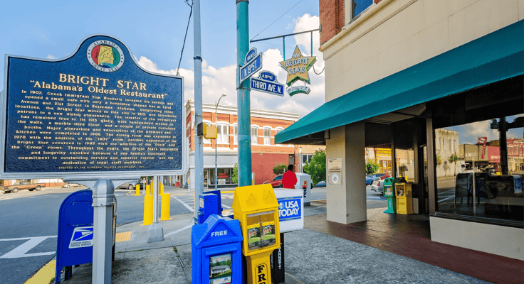 A historic marker stands outside the Bright Star restaurant in Bessemer, Alabama. The Greek restaurant, founded in 1907, is the oldest restaurant in Alabama. 