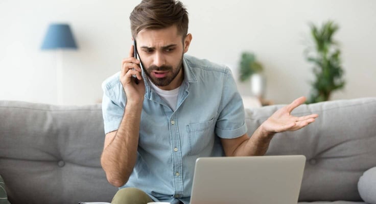 Angry man talking on phone disputing over computer laptop problem, stressed unsatisfied impatient customer arguing by mobile solving online difficulty with technical support complain on bad service