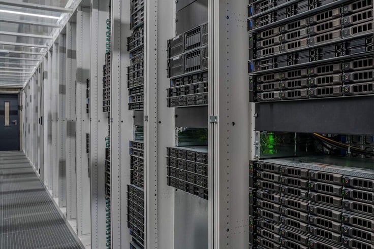 A photo of server racks in a data center A photo of server racks in a data center