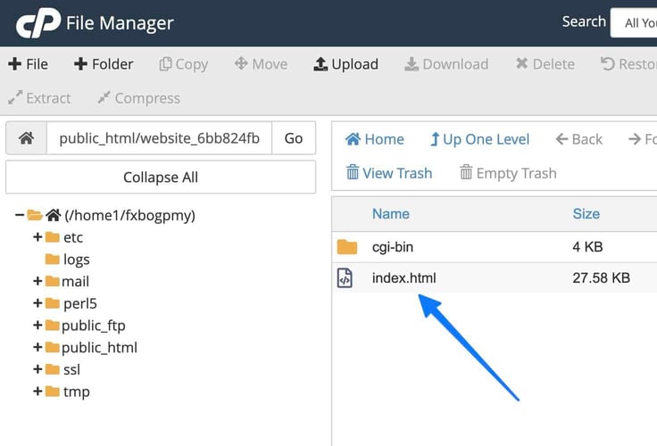 Refreshed file manager with blue arrow pointing to index.html