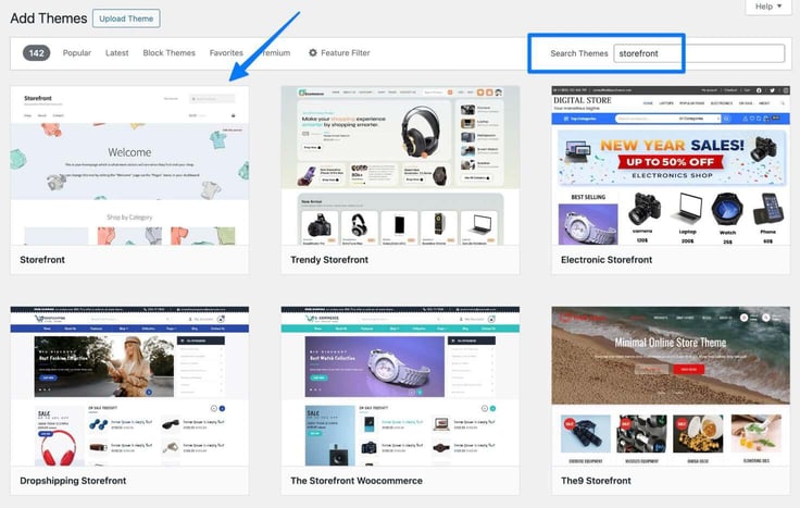 Blue box around Search themes text box - search "storefront" - blue arrow pointing to first Storefront Theme