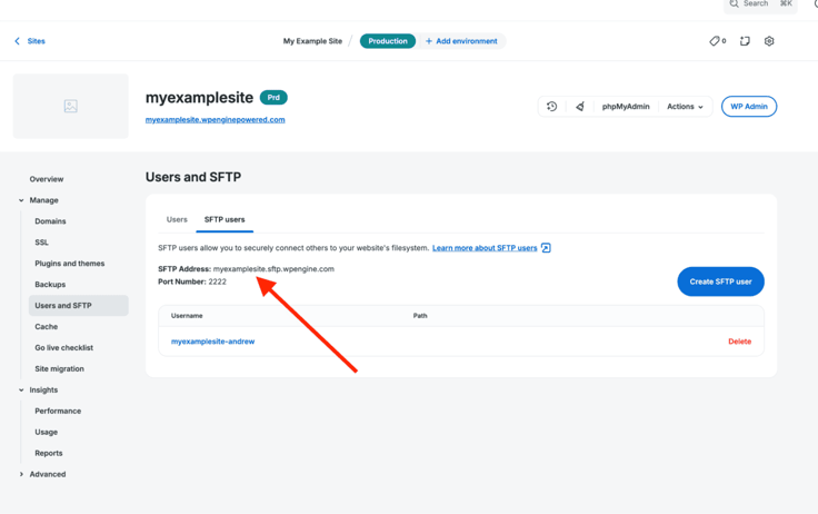 WP Engine hosting dashboard Users and SFTP section with SFTP Users tab selected, displaying SFTP address myexamplesite.sftp.wpengine.com on port 2222, with an existing SFTP username and red arrows pointing to the address and username fields