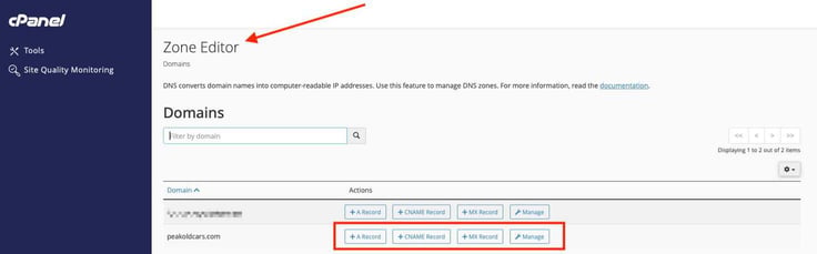 cPanel Zone Editor page showing the Domains section with a filter by domain search field, two domain rows listed, and a red annotation arrow pointing down to the Zone Editor page heading, with the peakoldcars.com row highlighted by a red annotation rectangle around its four action buttons for A Record, CNAME Record, MX Record, and Manage. cPanel Zone Editor page showing the Domains section with a filter by domain search field, two domain rows listed, and a red annotation arrow pointing down to the Zone Editor page heading, with the peakoldcars.com row highlighted by a red annotation rectangle around its four action buttons for A Record, CNAME Record, MX Record, and Manage.