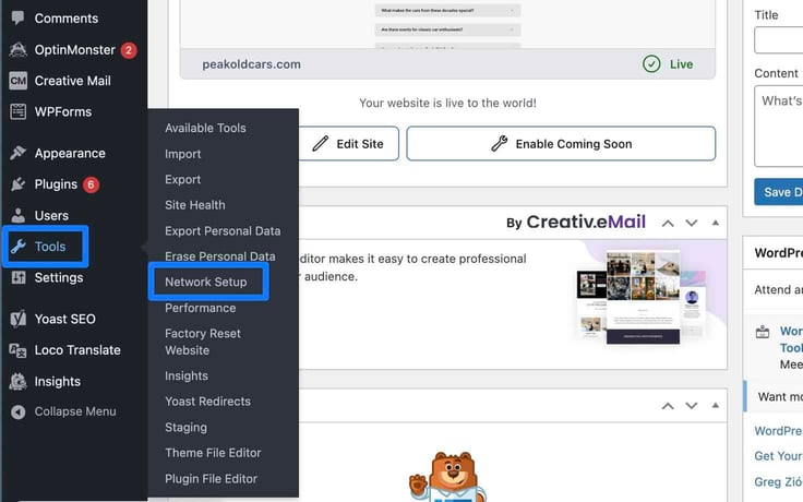 The WordPress admin sidebar displays menu items including Comments, OptinMonster, Creative Mail, WPForms, Appearance, Plugins, Users, and a highlighted Tools menu expanded to reveal a submenu with Available Tools, Import, Export, Site Health, Export Personal Data, Erase Personal Data, and a boxed "Network Setup" option, Performance, Factory Reset Website, Insights, Yoast Redirects, Staging, and file editor options, with a "peakoldcars.com" live status banner visible in the background. The WordPress admin sidebar displays menu items including Comments, OptinMonster, Creative Mail, WPForms, Appearance, Plugins, Users, and a highlighted Tools menu expanded to reveal a submenu with Available Tools, Import, Export, Site Health, Export Personal Data, Erase Personal Data, and a boxed "Network Setup" option, Performance, Factory Reset Website, Insights, Yoast Redirects, Staging, and file editor options, with a "peakoldcars.com" live status banner visible in the background.
