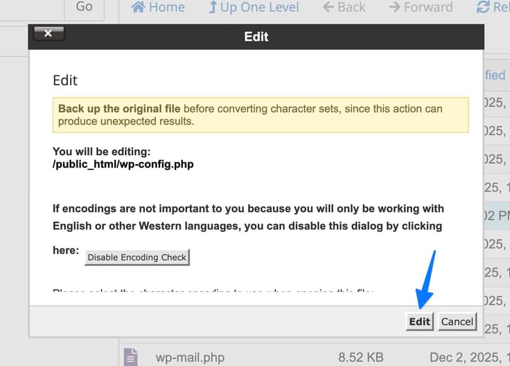 A file manager "Edit" confirmation dialog warns to back up the original file before converting character sets, confirming the file to be edited is /public_html/wp-config.php, with an option to disable the encoding check dialog for English or Western language use, and Edit and Cancel buttons at the bottom with a blue arrow pointing to the Edit button. A file manager "Edit" confirmation dialog warns to back up the original file before converting character sets, confirming the file to be edited is /public_html/wp-config.php, with an option to disable the encoding check dialog for English or Western language use, and Edit and Cancel buttons at the bottom with a blue arrow pointing to the Edit button.