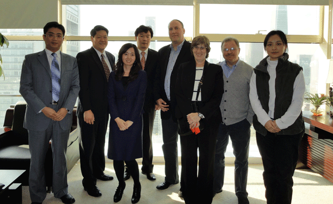 Ai Squared CEO with representatives from Hand in Hand, ATIA, Perkins, and Tsinghua University
