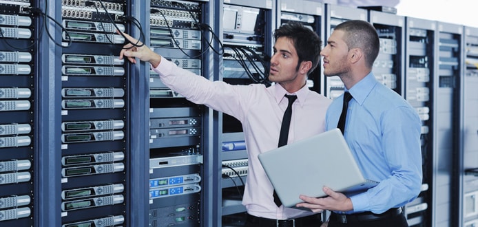 Server technicians working on hardware Server technicians working on hardware