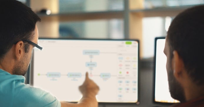 Photo of two people collaborating with Mendix Photo of two people collaborating with Mendix
