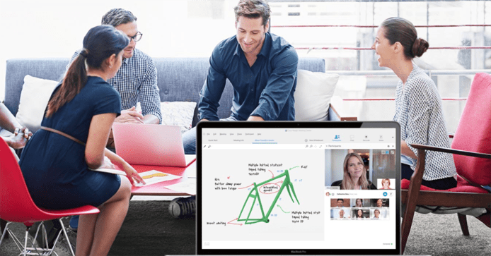 Photo of a group of employees collaborating on Cisco WebEx Photo of a group of employees collaborating on Cisco WebEx