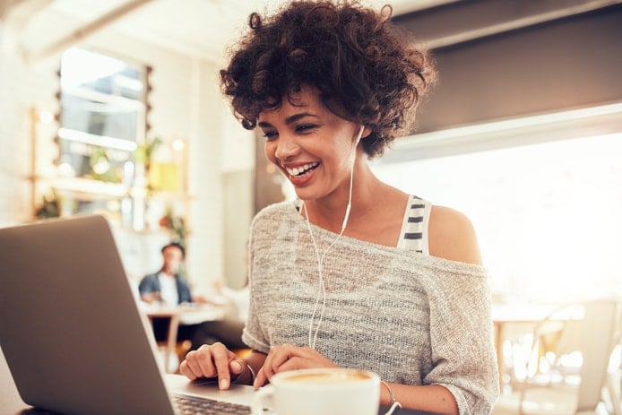 Photo of a woman on a computer Photo of a woman on a computer